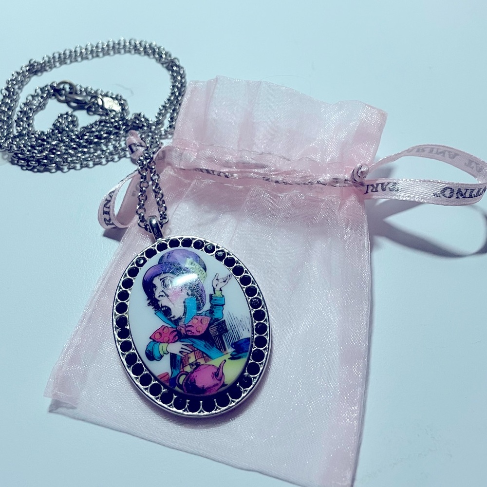 Vintage Tarina Tarantino necklace. Mad Hatter pendant in good used condition.